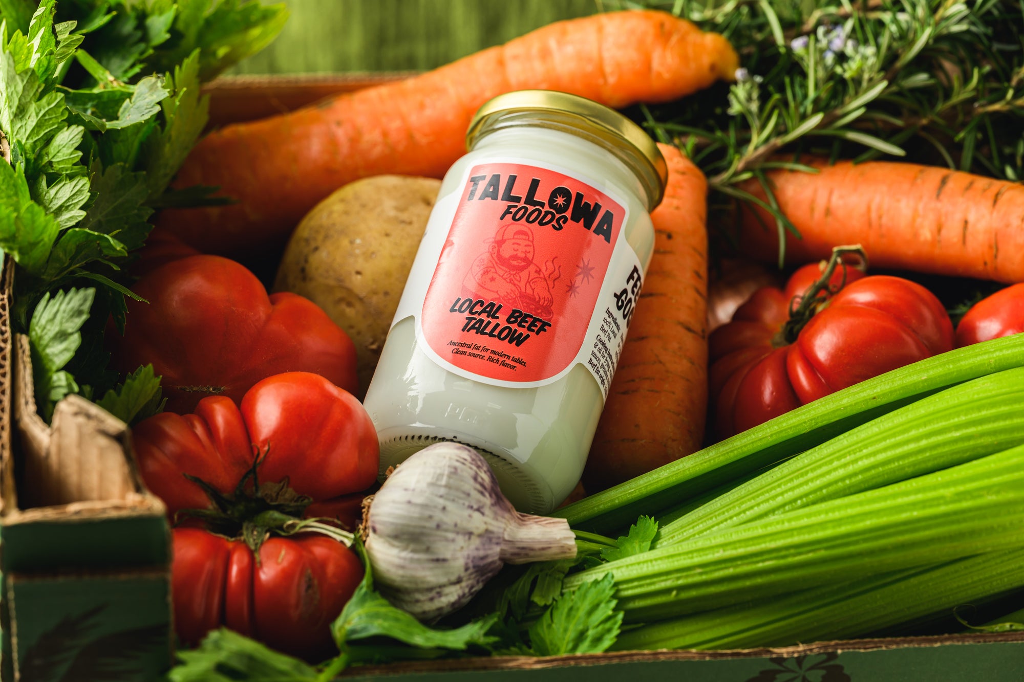 Tallowa local beef tallow jar surrounded by fresh vegetables traditional animal fat for cooking in Malta Europe